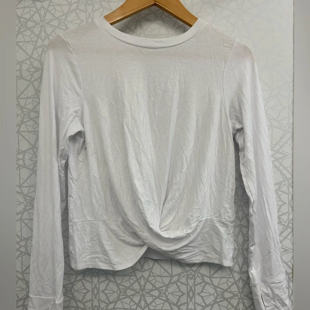 2 new white Terez tops with some light flaws. Girls size XL tie & cross fronts